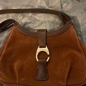 New dooney & bourke moss shoulder bag. The color is rust. New with plastic bag.